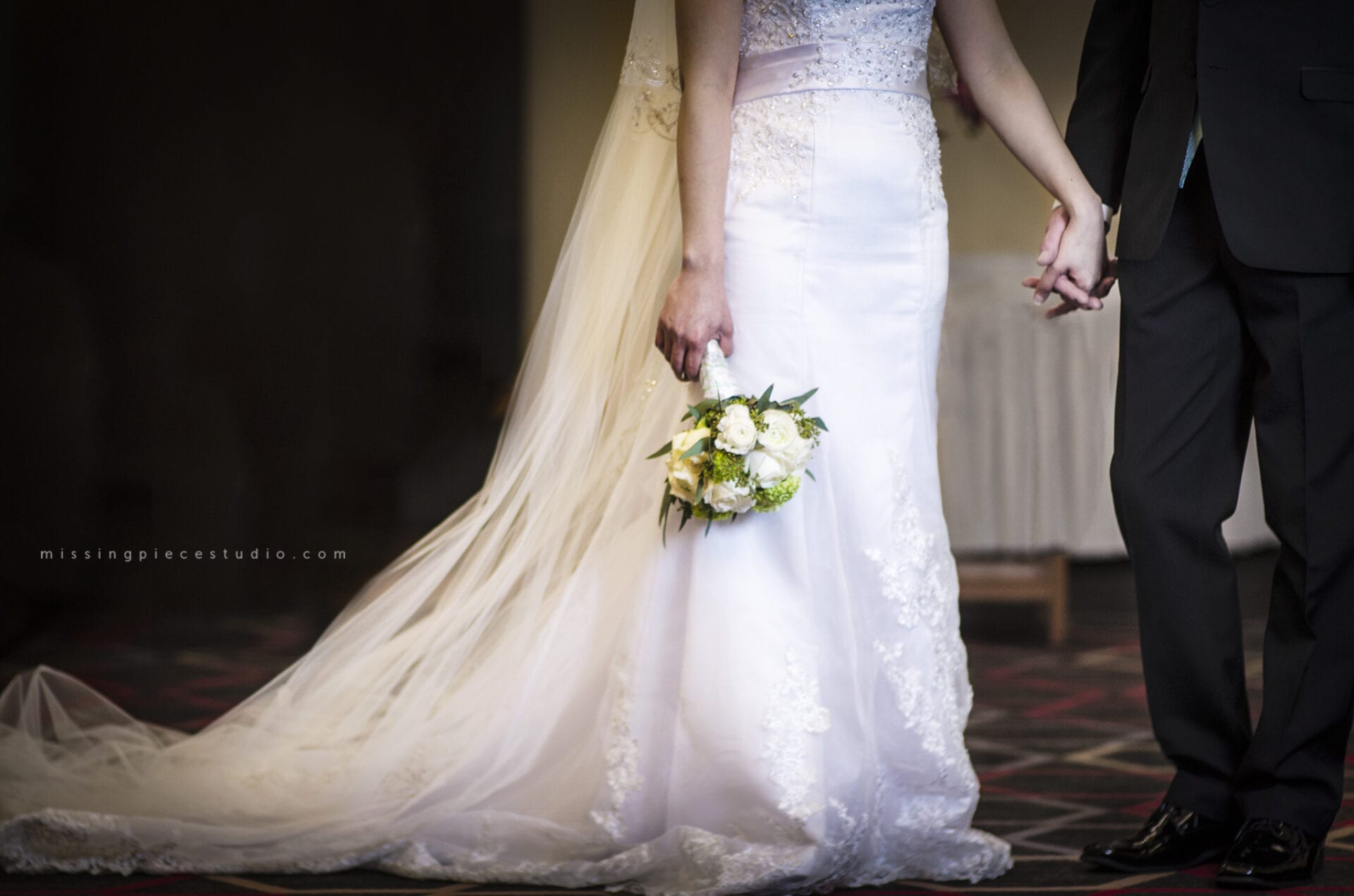 Four Points by Sheraton Edmonton South Wedding Photography Photographer Ceremony Venue-holding hands
