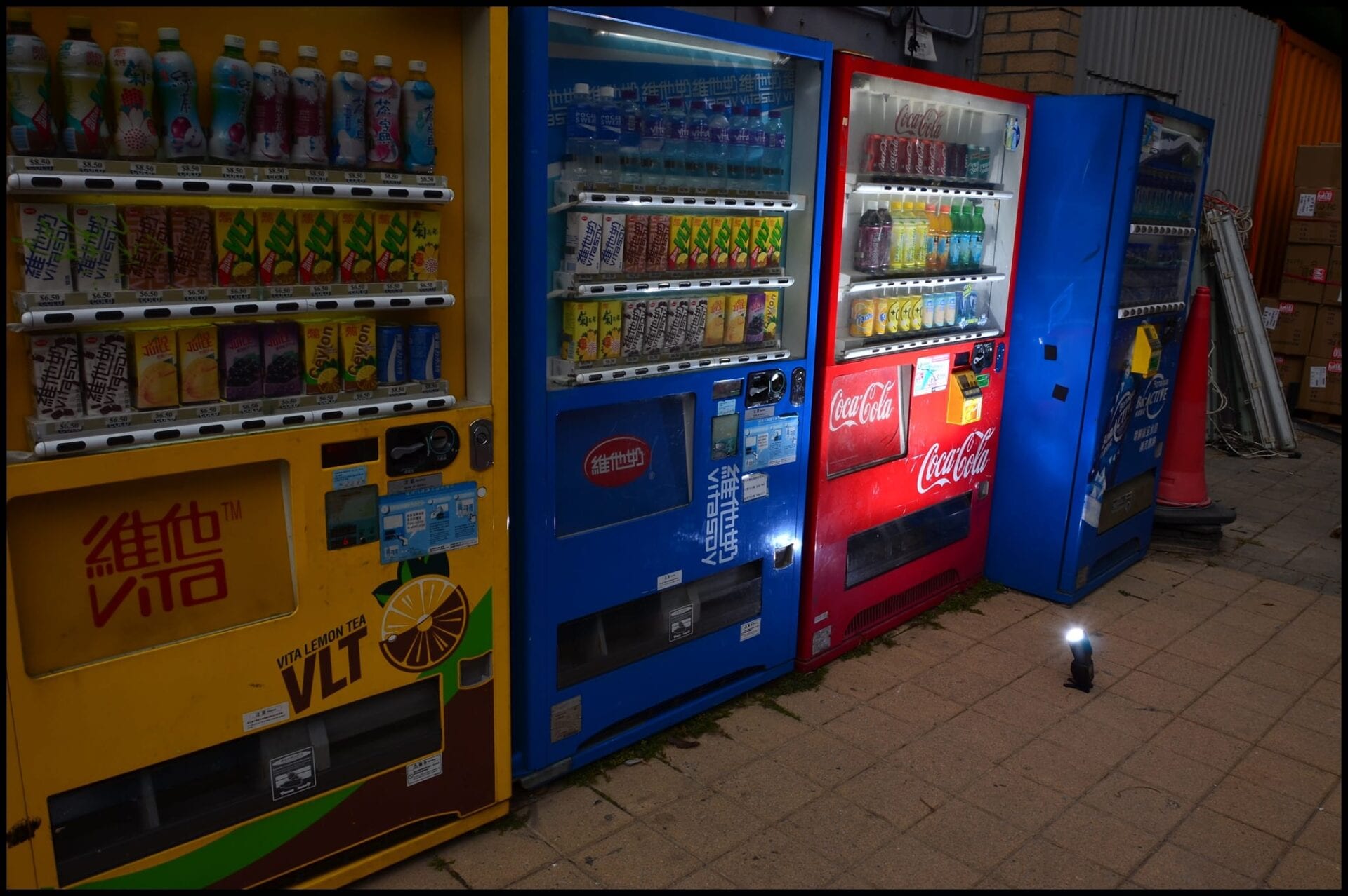 a row of vending machine lit by a nikon sb700 speedlight