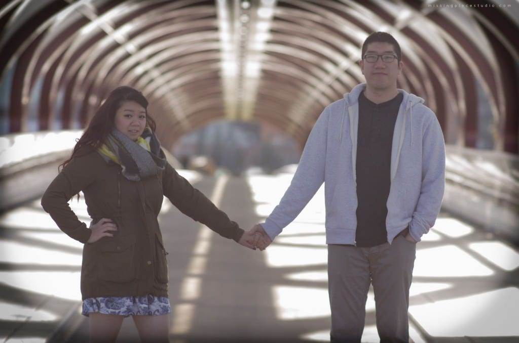 A couple being photographed at the peace bridge in Calgary YYC Canada